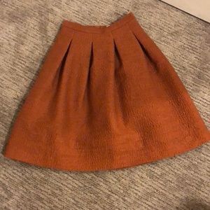 H&M pleated skirt in burnt orange